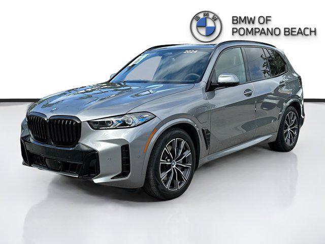 used 2024 BMW X5 PHEV car, priced at $76,000