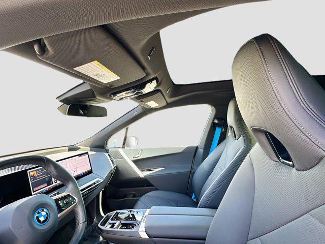 used 2024 BMW iX car, priced at $64,000