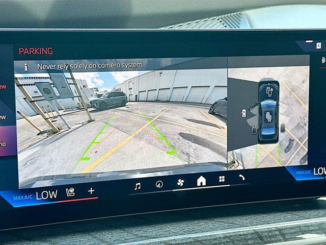 used 2024 BMW 740 car, priced at $64,200