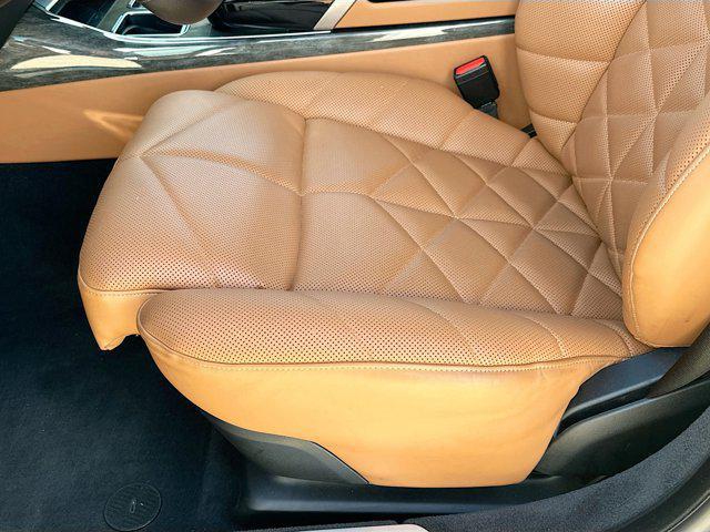 used 2024 BMW 740 car, priced at $64,200