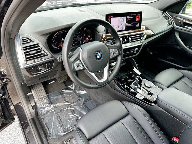 used 2024 BMW X4 car, priced at $42,000