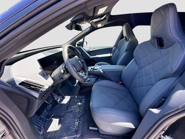 new 2026 BMW iX car, priced at $97,825