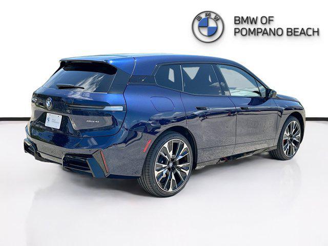 new 2026 BMW iX car, priced at $97,825