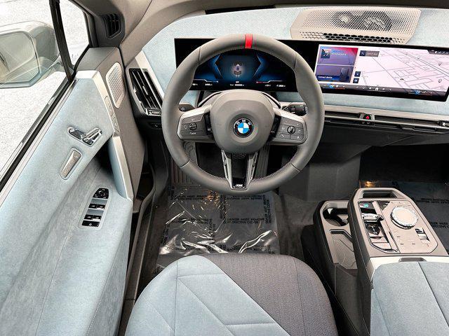 new 2025 BMW iX car, priced at $117,990