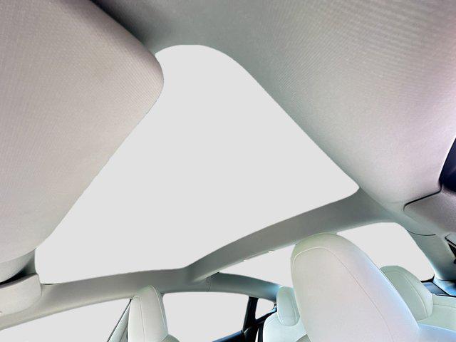 used 2022 Tesla Model 3 car, priced at $23,000