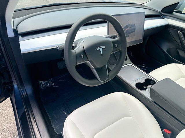 used 2022 Tesla Model 3 car, priced at $23,000