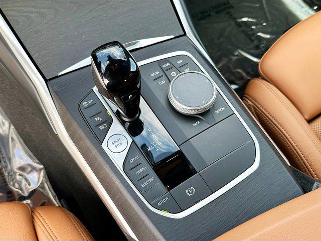 used 2022 BMW 330e car, priced at $27,500