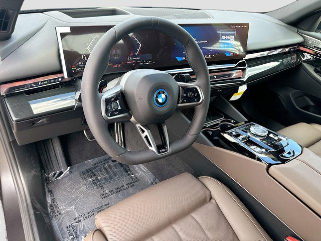 new 2026 BMW 550e car, priced at $89,525