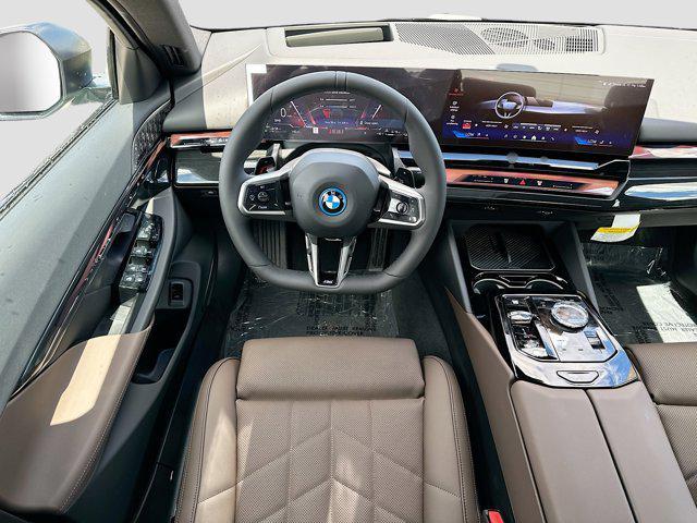 new 2026 BMW 550e car, priced at $89,525