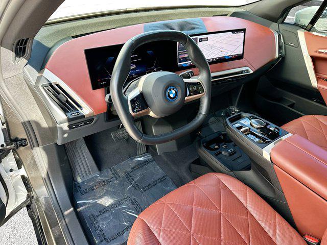 used 2024 BMW iX car, priced at $67,999