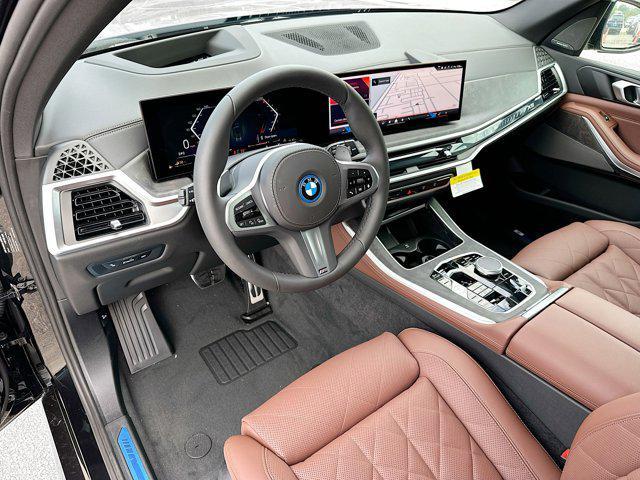 new 2025 BMW X5 PHEV car, priced at $82,875