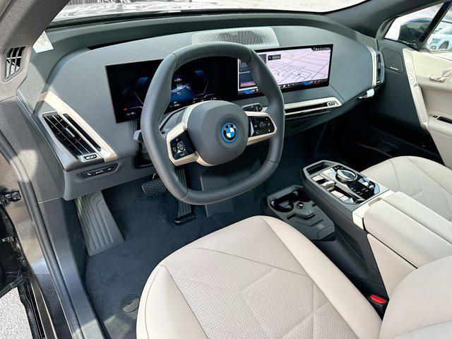 new 2025 BMW iX car, priced at $97,825