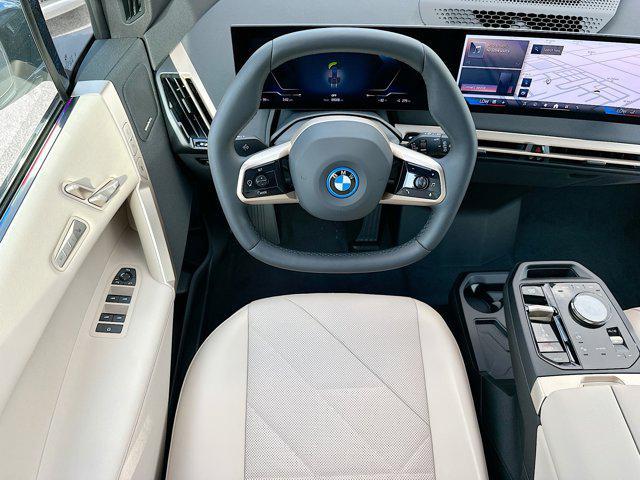 new 2025 BMW iX car, priced at $97,825