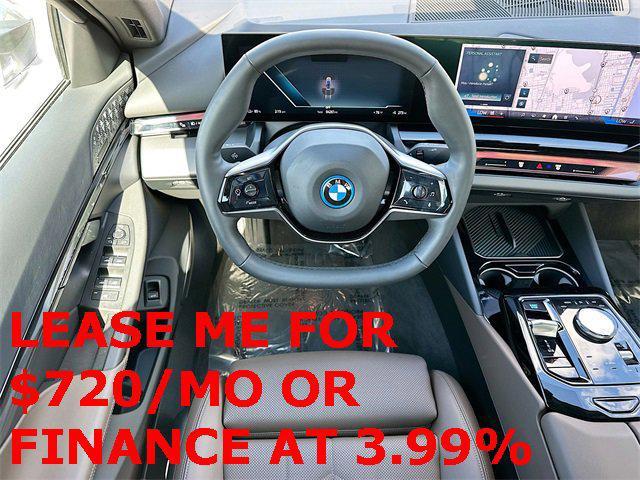 used 2024 BMW i5 car, priced at $59,500