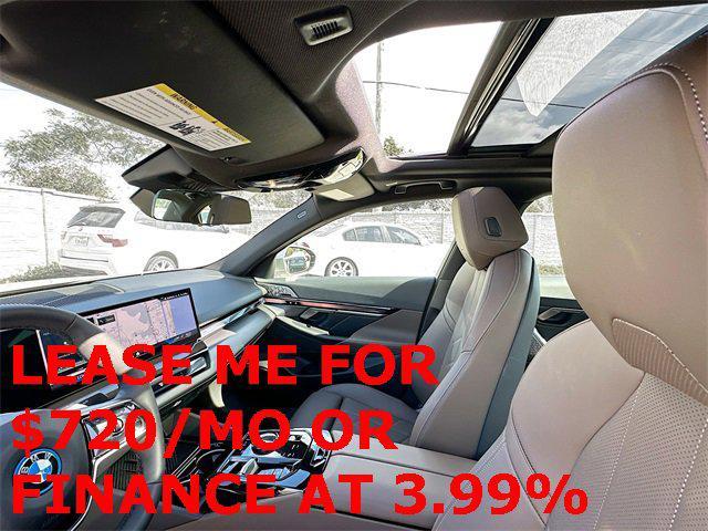 used 2024 BMW i5 car, priced at $59,500