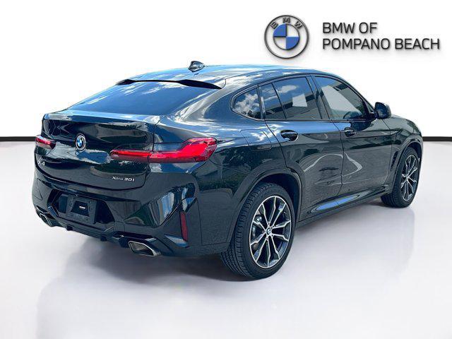 used 2022 BMW X4 car, priced at $37,500