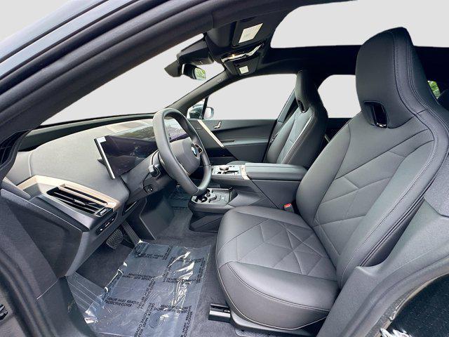 new 2026 BMW iX car, priced at $86,345