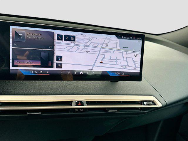 new 2026 BMW iX car, priced at $86,345