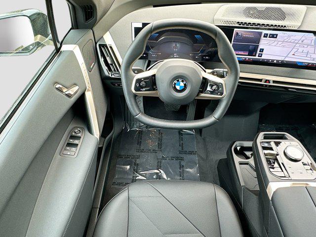 new 2026 BMW iX car, priced at $86,345