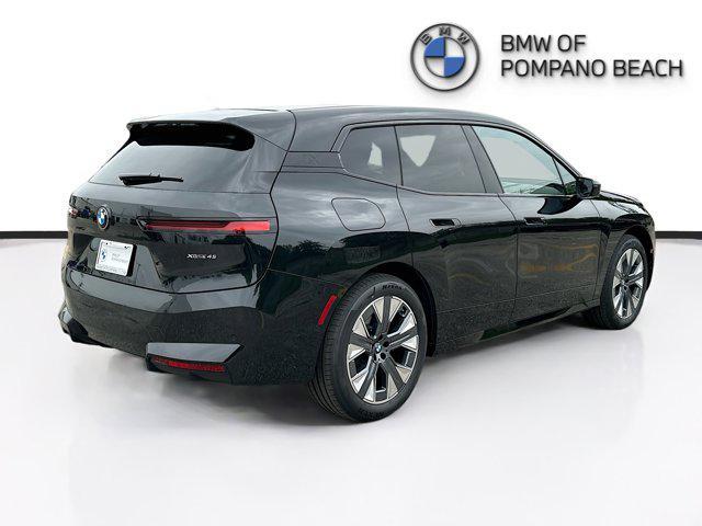 new 2026 BMW iX car, priced at $86,345