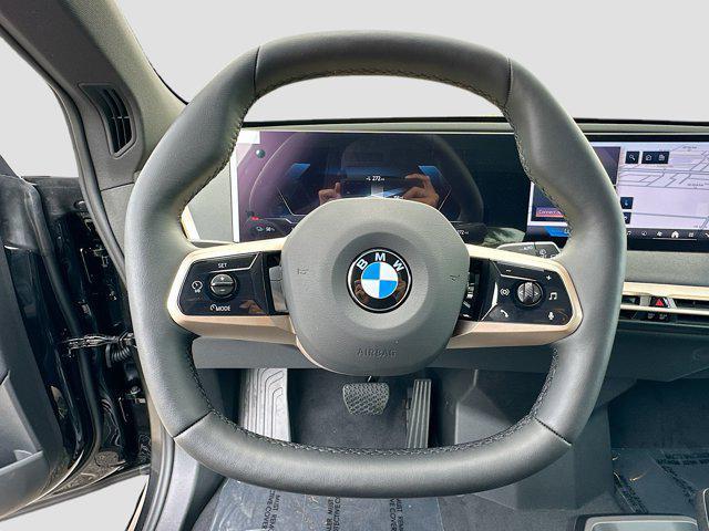 new 2026 BMW iX car, priced at $86,345