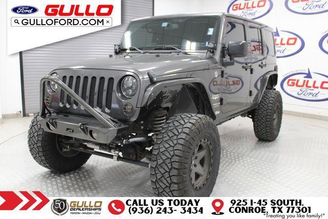 used 2014 Jeep Wrangler Unlimited car, priced at $19,991