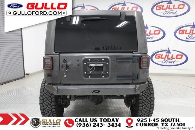 used 2014 Jeep Wrangler Unlimited car, priced at $19,991