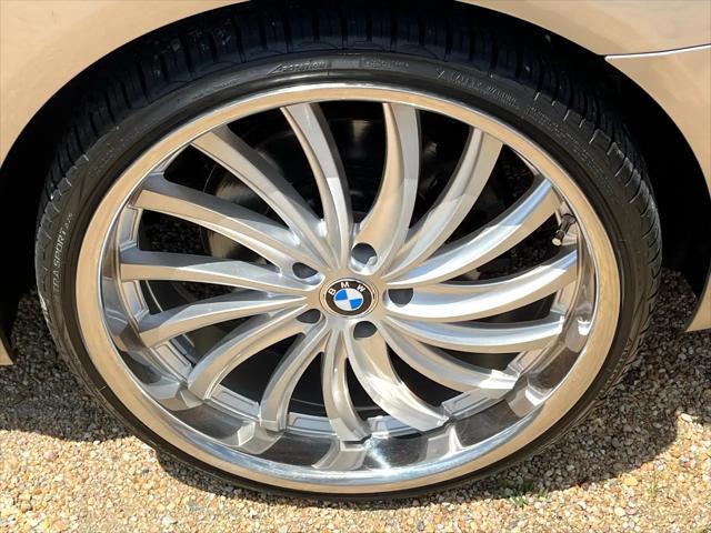 used 2013 BMW 750 car, priced at $11,959