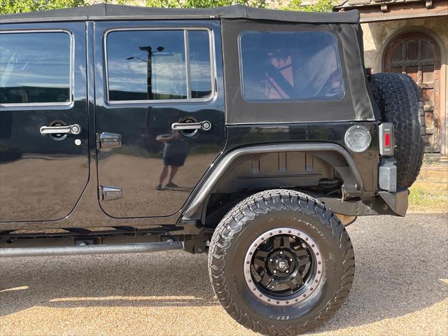 used 2018 Jeep Wrangler JK Unlimited car, priced at $22,959