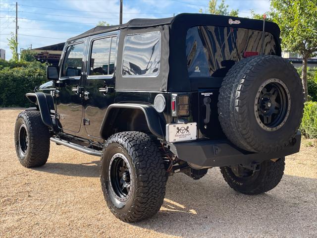 used 2018 Jeep Wrangler JK Unlimited car, priced at $22,959