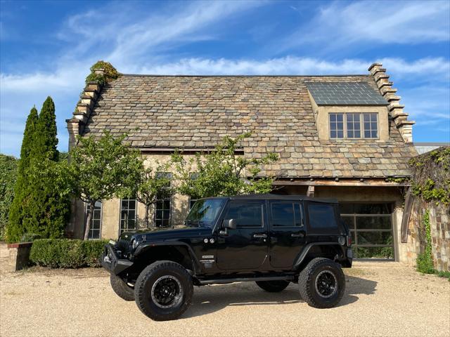 used 2018 Jeep Wrangler JK Unlimited car, priced at $22,959