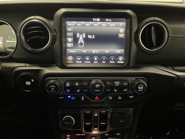 used 2022 Jeep Wrangler Unlimited 4xe car, priced at $30,749