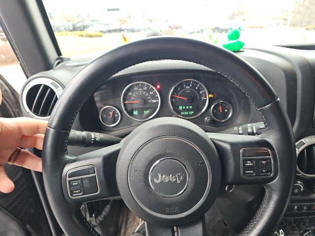 used 2015 Jeep Wrangler Unlimited car, priced at $18,249