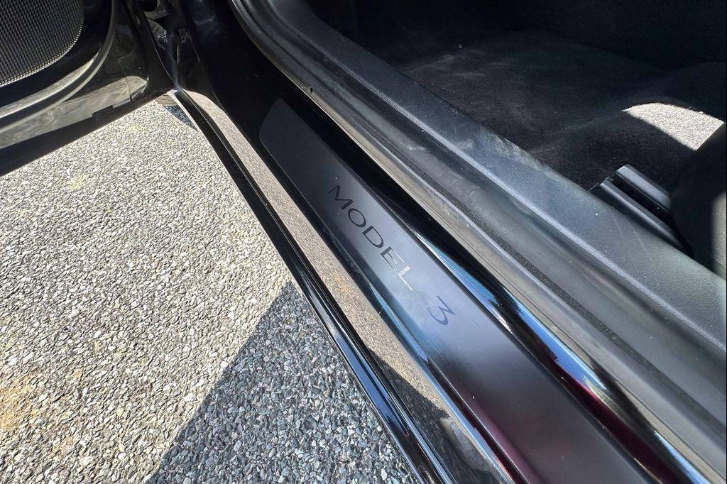 used 2021 Tesla Model 3 car, priced at $19,400