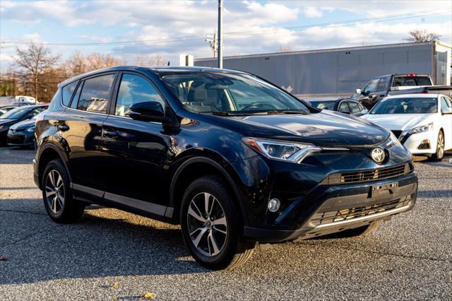 used 2018 Toyota RAV4 car, priced at $19,900