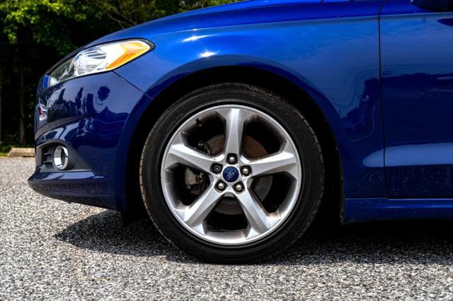 used 2015 Ford Fusion car, priced at $8,900