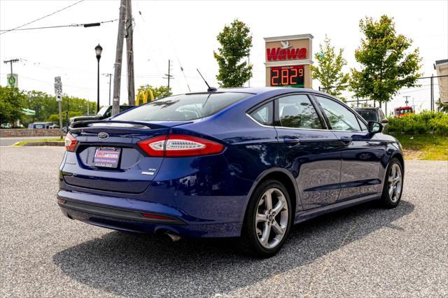 used 2015 Ford Fusion car, priced at $8,900