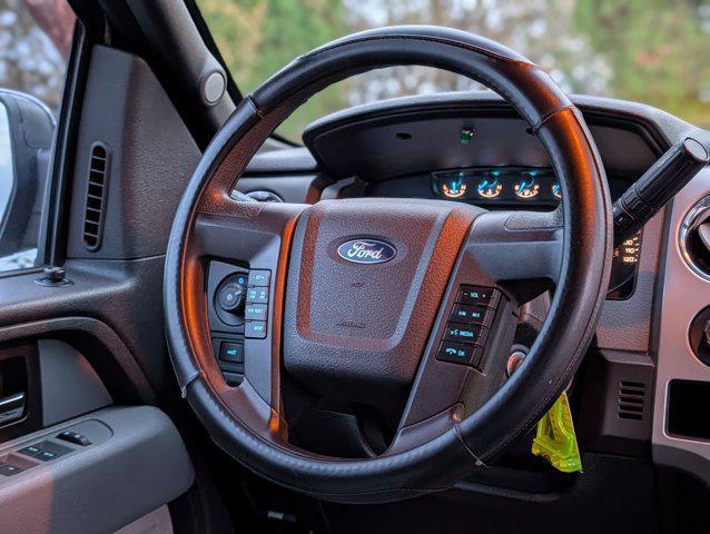 used 2013 Ford F-150 car, priced at $15,000