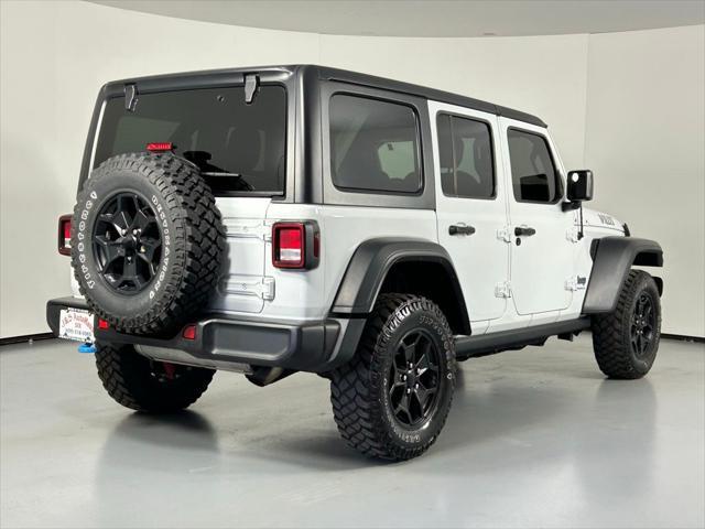 used 2023 Jeep Wrangler 4xe car, priced at $27,999