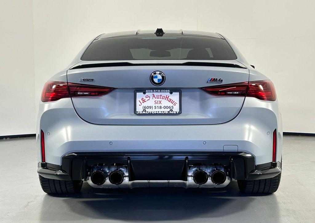 used 2025 BMW M4 car, priced at $87,999