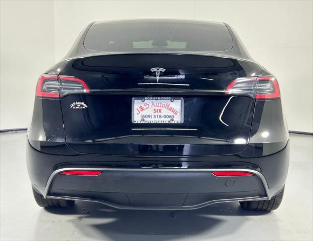 used 2024 Tesla Model Y car, priced at $33,999