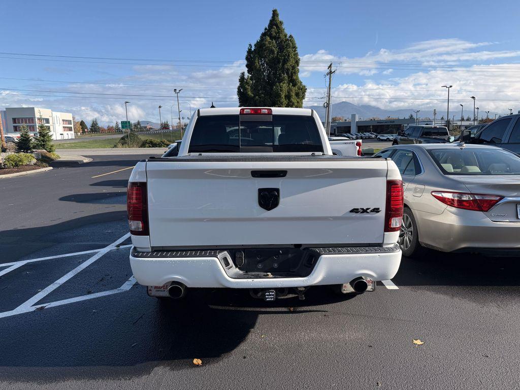 used 2018 Ram 1500 car, priced at $26,681
