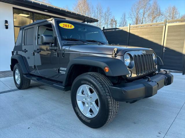 used 2014 Jeep Wrangler Unlimited car, priced at $17,450