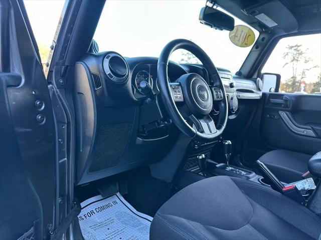 used 2014 Jeep Wrangler Unlimited car, priced at $17,450