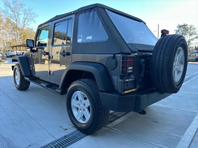 used 2014 Jeep Wrangler Unlimited car, priced at $17,450