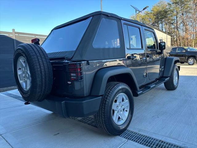 used 2014 Jeep Wrangler Unlimited car, priced at $17,450