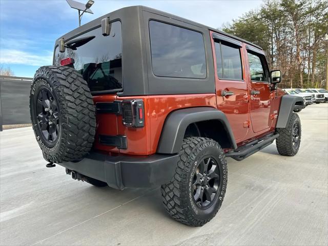 used 2014 Jeep Wrangler Unlimited car, priced at $17,450