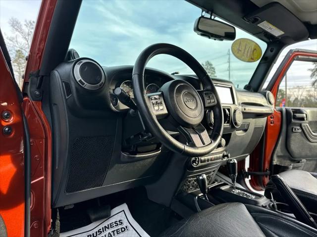 used 2014 Jeep Wrangler Unlimited car, priced at $17,450