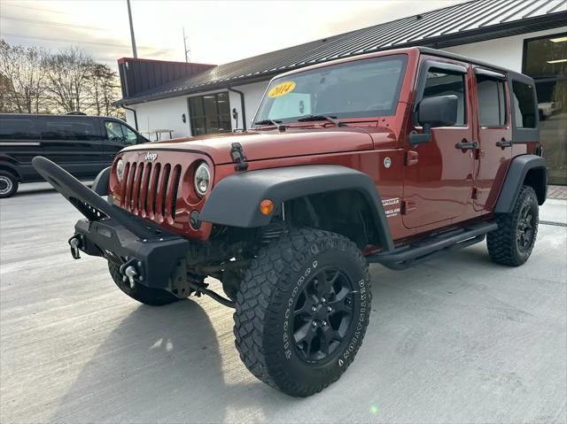 used 2014 Jeep Wrangler Unlimited car, priced at $17,450