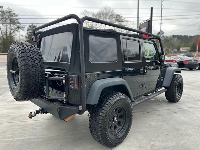 used 2013 Jeep Wrangler Unlimited car, priced at $14,999